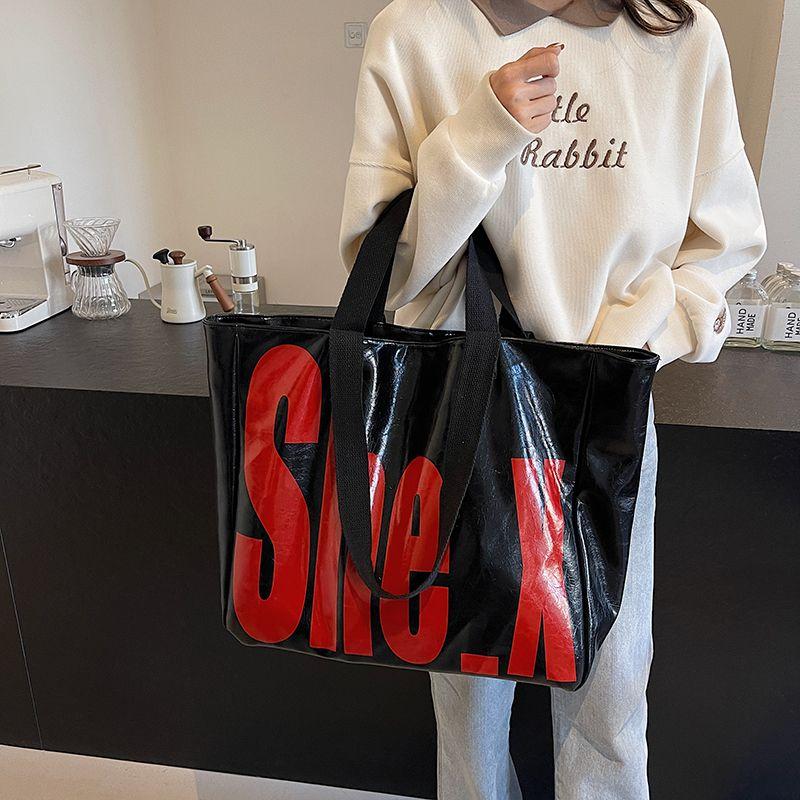 

Japanese and Korean Double-Sided Letter Big Bag 2025 New Arrival Outdoor Lightweight Waterproof Large Capacity Shopping Bag Commuter Tote Black