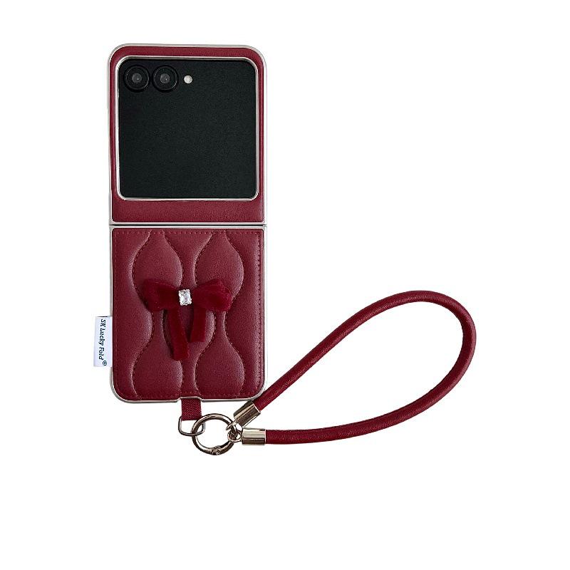 Fashionable Bowknot Motorola Razr60 Drop-proof Foldable Phone Case with Anti-lost Rope.