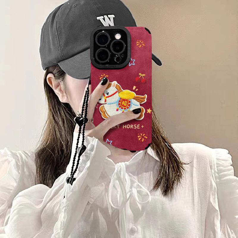 Applicable to Apple 17promax mobile phone case iPhone16 embroidered pony bracelet 15 New Year's 14 silicone anti-drop 13