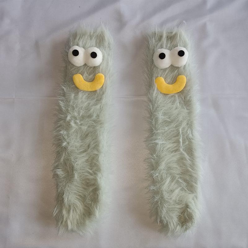 A pair of ugly cute funny socks women's medium tube socks autumn and winter floor sleeping socks coral fleece home hair fluffy c