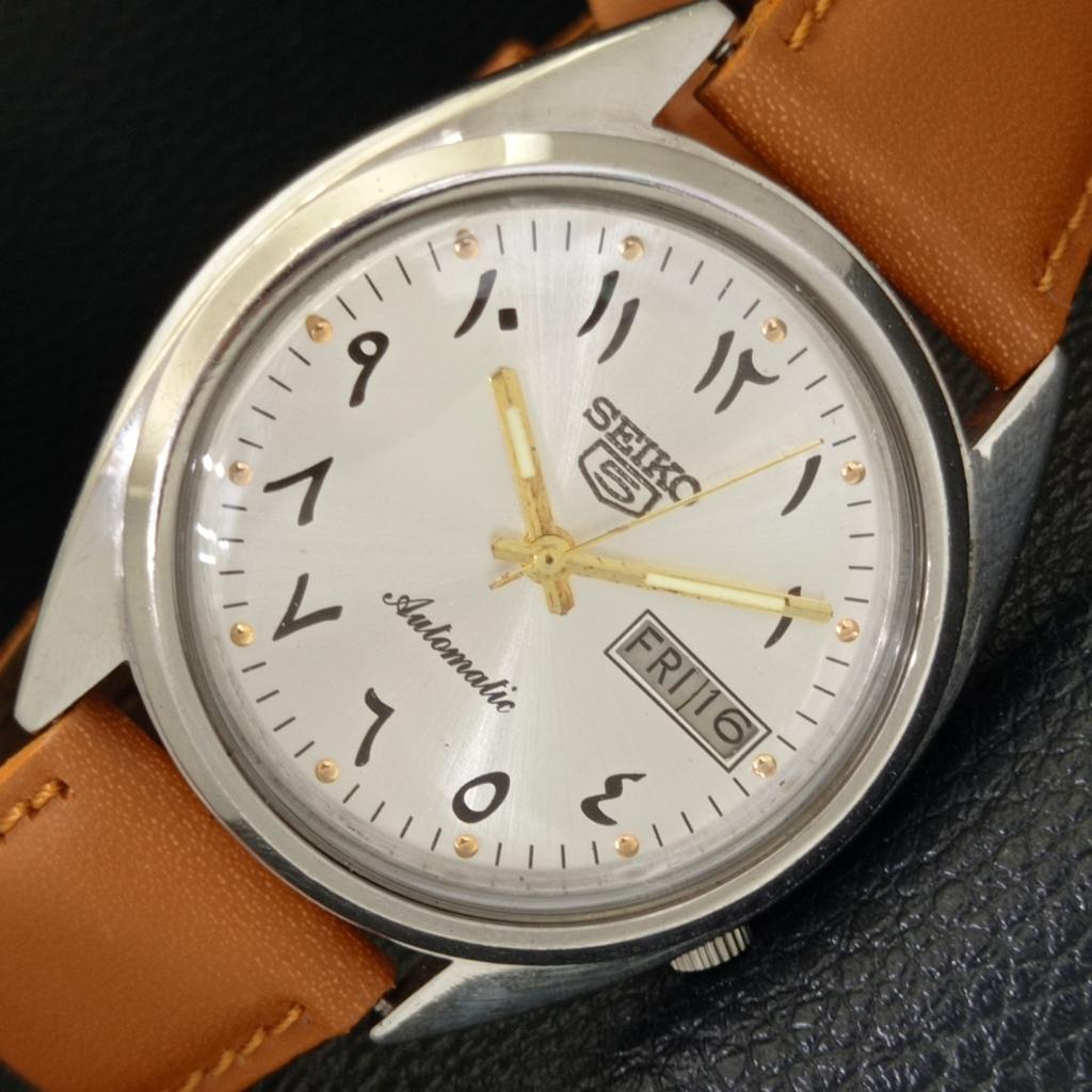 

SEIKO 5 AUTOMATIC VINTAGE 7009A JAPAN MENS ARABIC SILVER DIAL WATCH a702674-1 R209-a702674