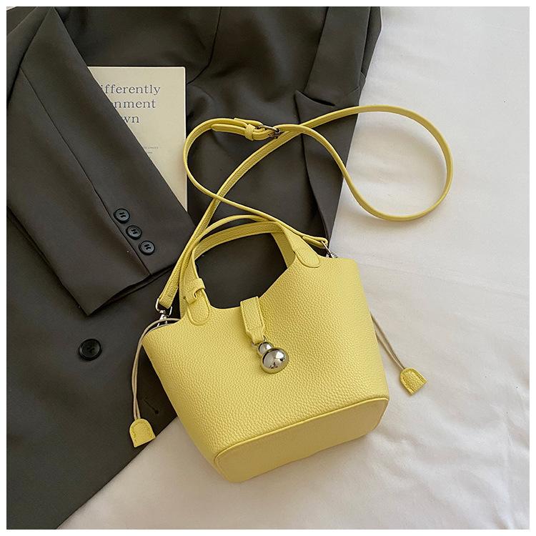 Korean High-end Sense Simple Niche Handbag Women's 2025 Summer New Versatile Lychee Pattern Messenger Bucket Bag