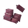 "Portable Travel Luggage Organizer: 7-Piece Storage and Shoe Bag Set"