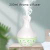 USB Desktop Air Humidifier Ultrasonic 200ML Essential Oil Diffuser Cold Mist Air Moisturizer  and Two Bottles of Essential Oil.