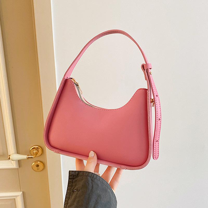 

Premium texture niche bag women s 2024 new summer versatile this year popular French white shoulder armpit bag рожевий