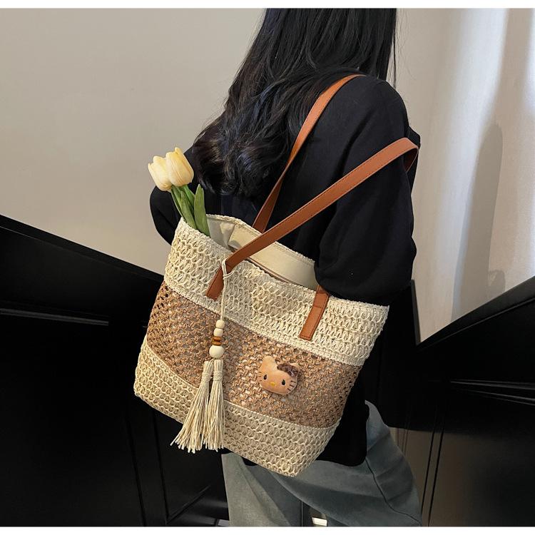Holiday Wind Beach Straw Bag Women's Summer New Hollow Woven Bag Large Capacity Commuter Shoulder Armpit Bag