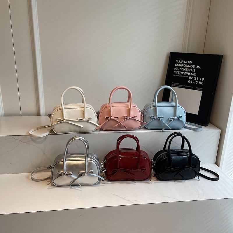 Bag 2025 new niche single bag women's bow simple casual bowling bag pillow bag hand bag