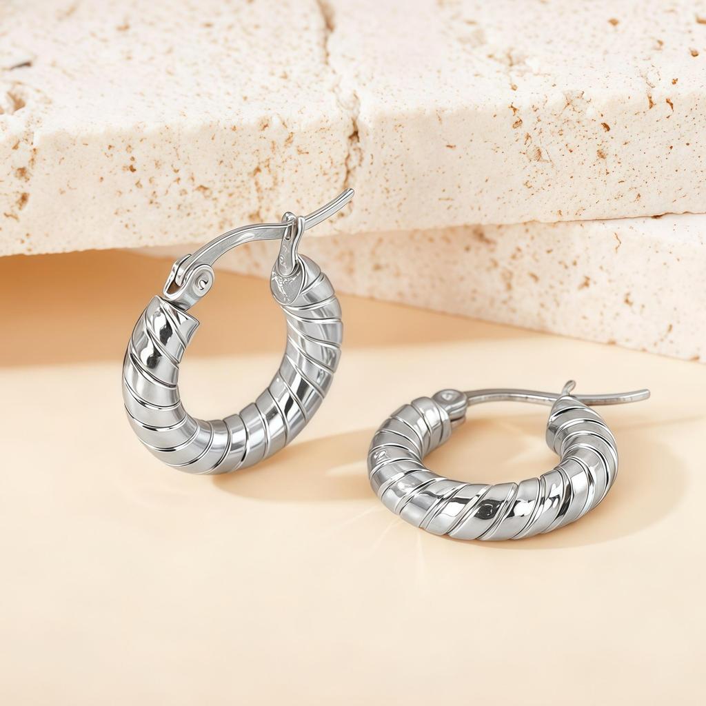 Orecchini a Cerchio Geometrici Intrecciati Europei e Americani in Acciaio al Titanio - Design Elegante e Unico per Donna
