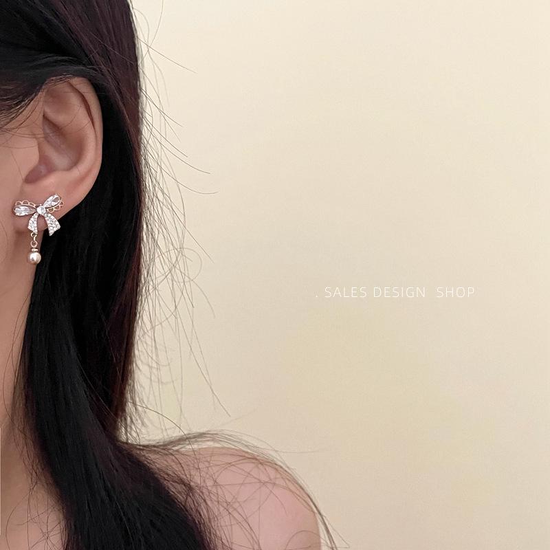 Korean Zircon Bow Pearl Stud Earrings - High-End, Versatile & Elegant.