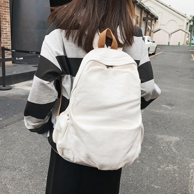 Japanese ins solid color schoolbag Korean version high school college student washed canvas backpack versatile couple backpack