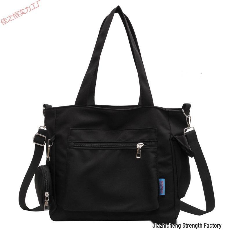 Женская холщовая сумка-тоут большой вместимости однотонного цвета через плечо и кроссбоди чёрный