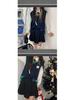 Niche Design College Style High-Waist Irregular Mini Skirt for Spring/Summer