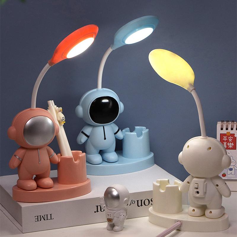 New Perfect for student study room or bedside table, this cozy and creative space-themed astronaut LED desk lamp features adjust
