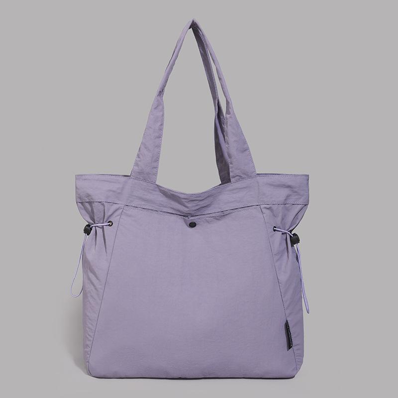 Simple and fashionable 2025 summer new fashion shoulder bag women's casual solid color large-capacity tote commuter bag