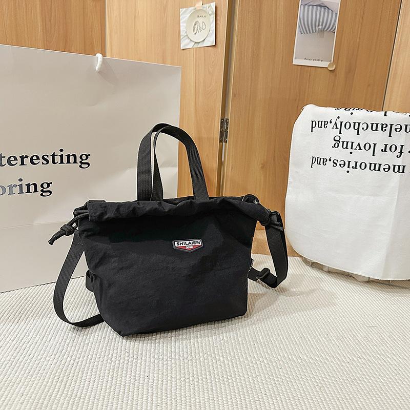Japanese casual oblique span bag 2025 new Korean version fashionable versatile commuter sports small bag tooling shoulder bucket bag