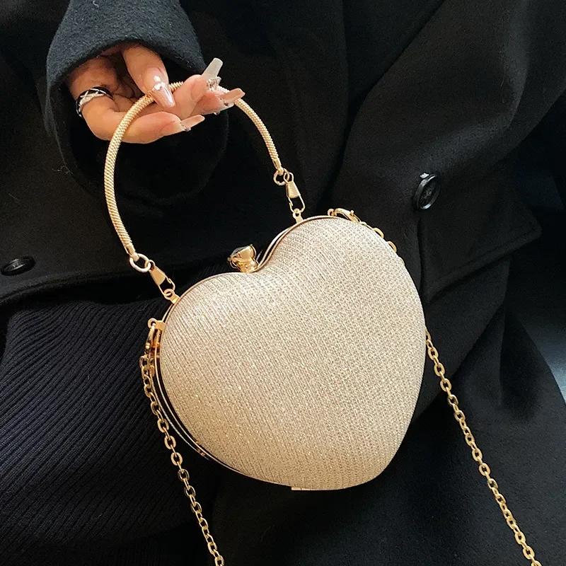 Borsa da sera con pochette, borsa da donna, borsa a mano lucida, a forma di cuore, in metallo, borsa a tracolla con catena alla moda, borsa di lusso da donna.