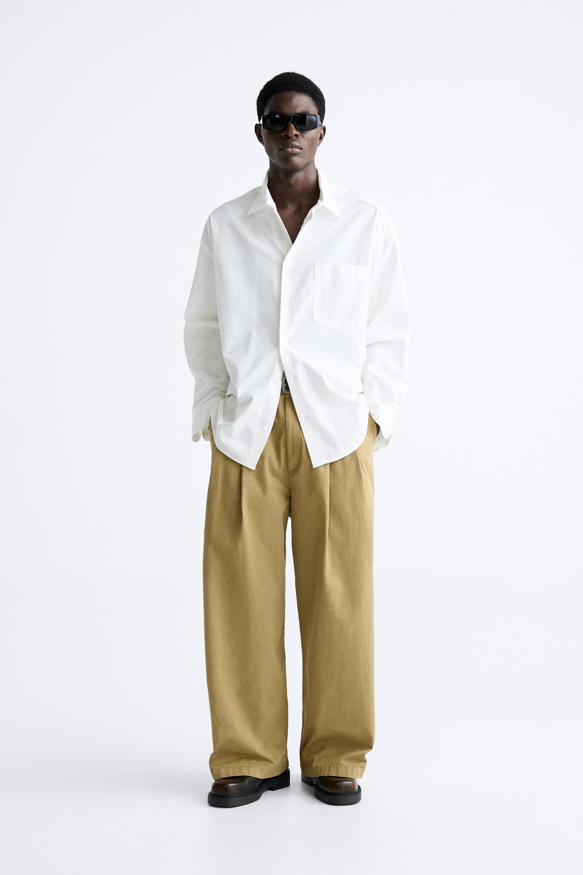 

БРЮКИ ШИРОКОГО КРОЯ СО СКЛИСАМИ