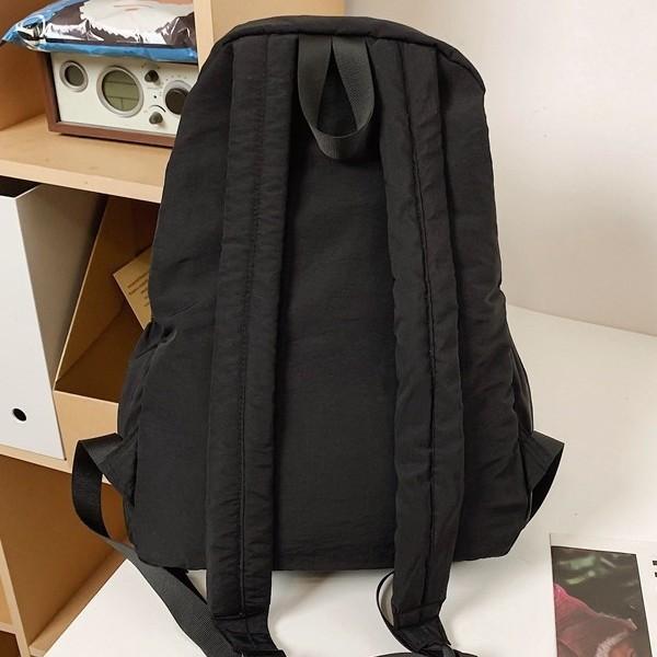 Schoolbag niche new backpack women's fashion versatile college student large capacity backpack Korean version casual light travel bag