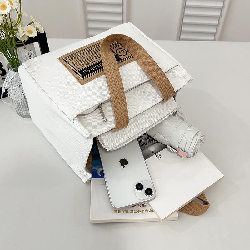 New canvas bag, multi-functional, fashionable and versatile, simple make-up bag, niche design, student class messenger bag