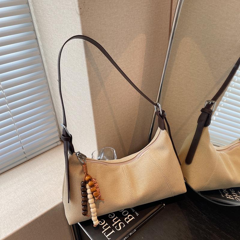 Textured single shoulder underarm bag women's new autumn and winter versatile commuter messenger dumpling bag