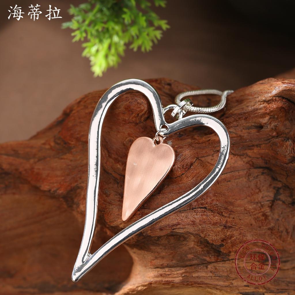 New hollow brushed love long pendant, women's simple and high-end heart-shaped snake chain long necklace