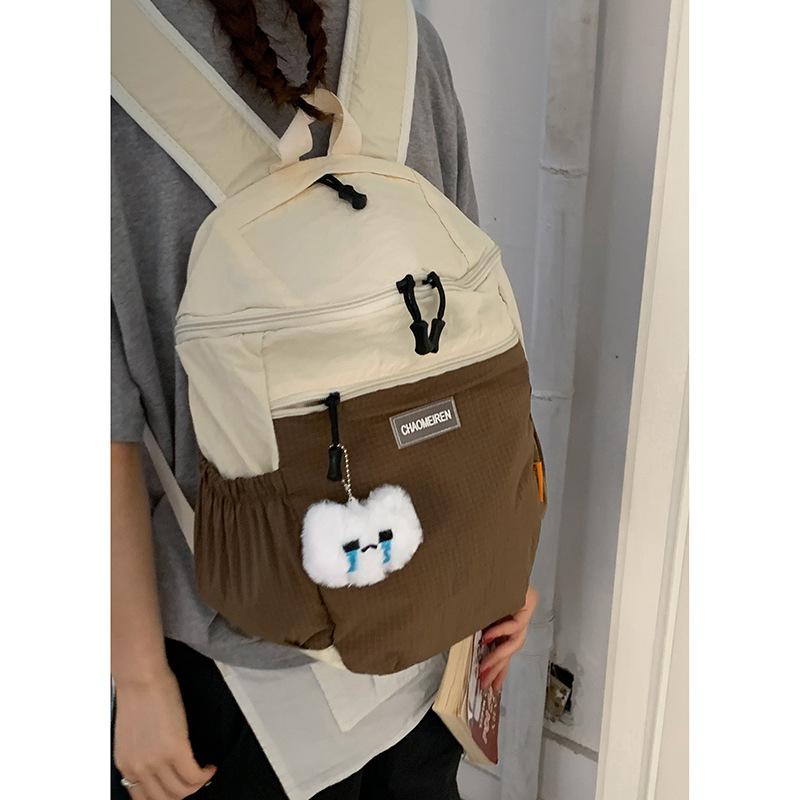 

Casual nylon cloth outdoor mountaineering bag women s 2025 new fashion college style backpack large capacity schoolbag темный кофе