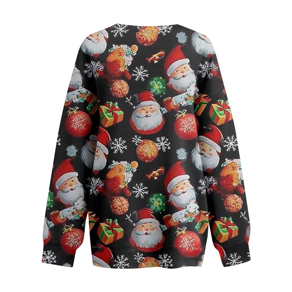 Damtopp med långärmad jultryck och avslappnad design