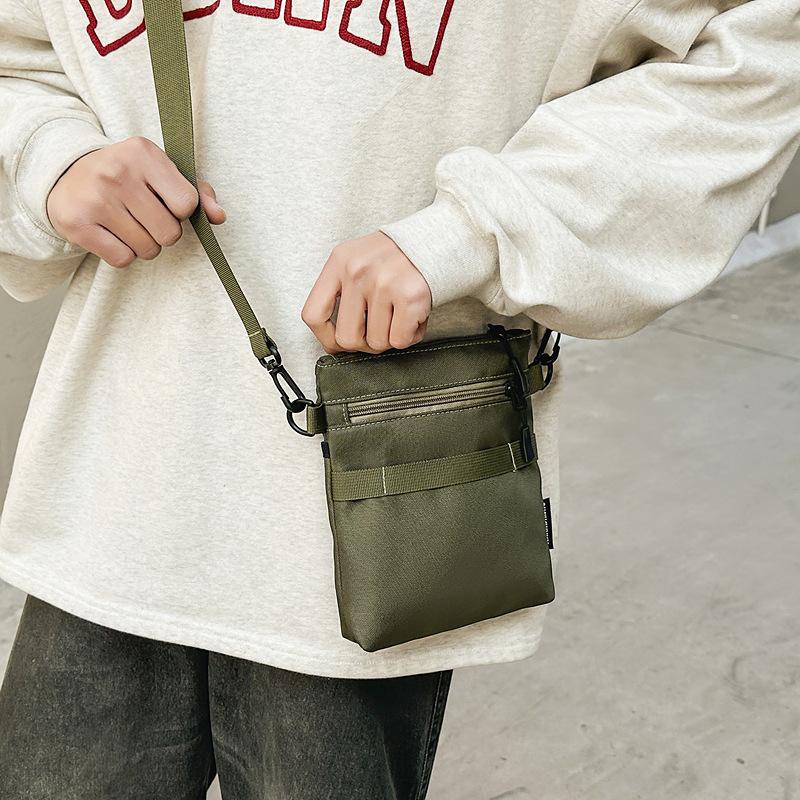 Korean casual trend messenger bag women's summer fashion sports portable Oxford cloth mobile phone bag versatile