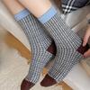 The Women's Mid-calf Socks with A Retro Striped Style In Autumn and Winter, Paired with Loafers, Are Fashionable and Versatile