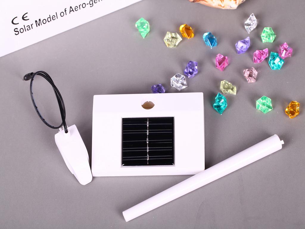 Polycrystalline Silicon Solar Windmill Model with Rotating Fan Blades