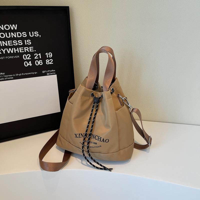 

Bucket bag women s 2025 new large-capacity commuter bag autumn and winter versatile shoulder bag canvas ins commuter bag хаки