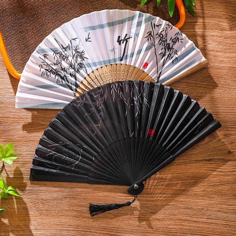 Chinese-Inspired Folding Fan: Ancient Style for Women, Children, and Students - Perfect for Hanfu, Cheongsam Dances, and Portable Summer Use.
