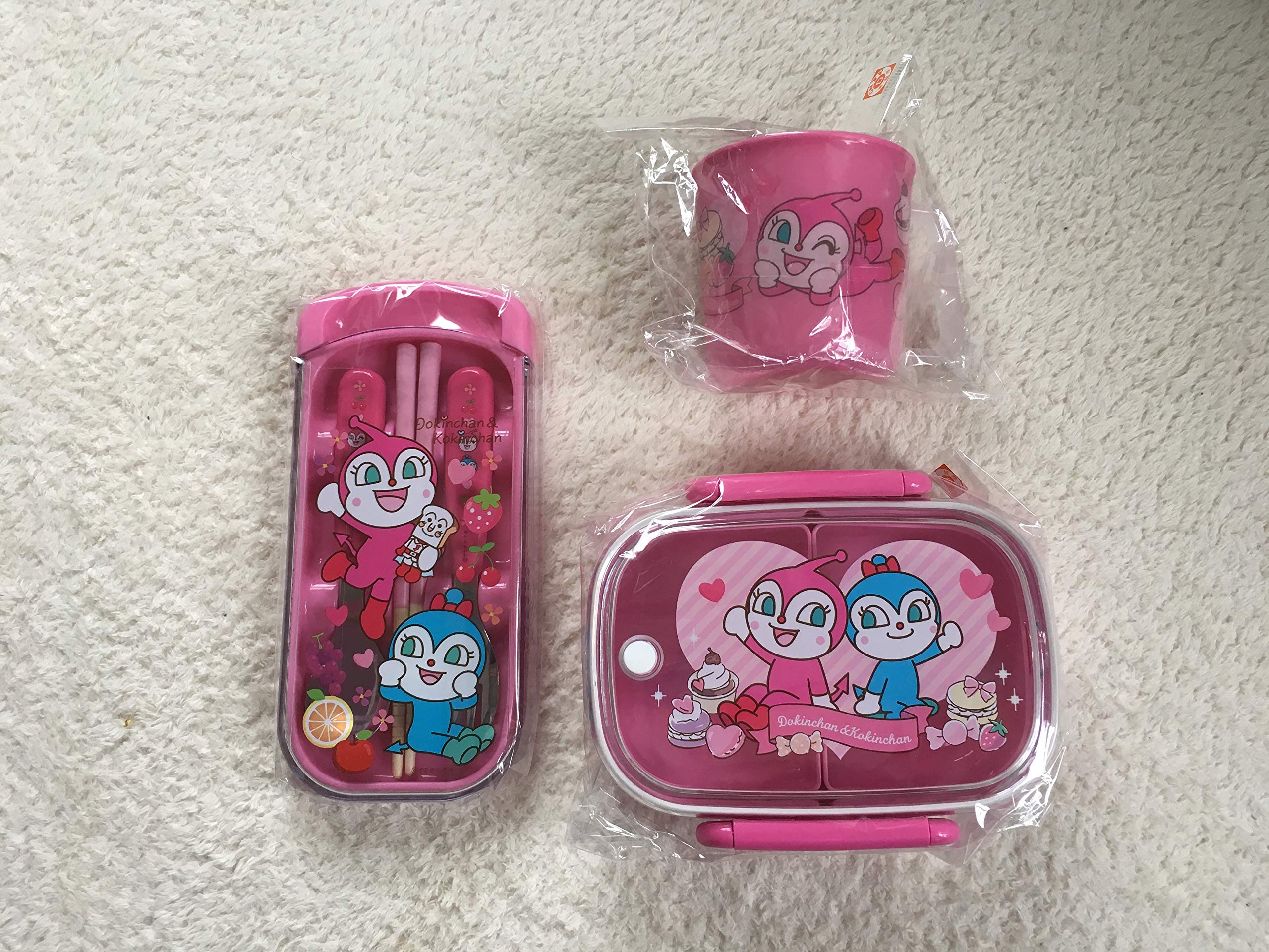 

Anpanman Museum Limited Edition Lunch Box with Cup, Chopsticks, Spoon, and Fork, featuring Dokin-chan and Kokin-chan, perfect for kindergarten and