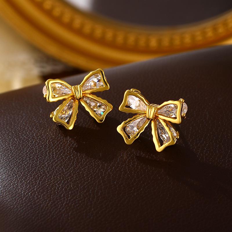 Elegant Gold-Plated Zirconia Bow Stud Earrings - High-End Fashionable Design for Women