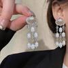 Silver Needle Shell Pearl Tassel Stud Earrings – Elegant and Unique Design for Women