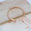 New Fashion Knot Heart Metal Bangle: Chic, Minimalist, Cold Style Design
