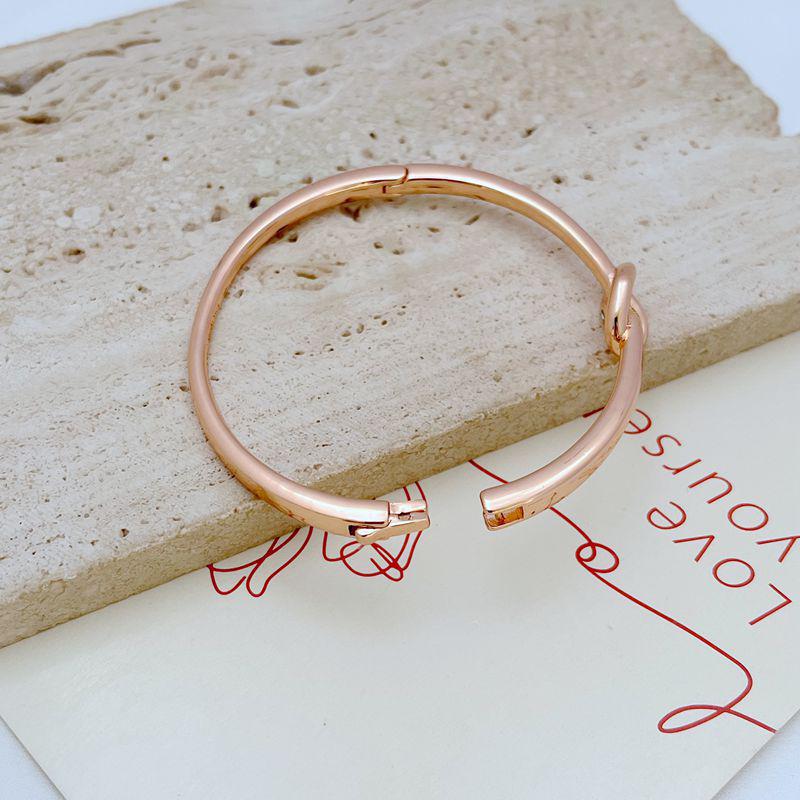 New Fashion Knot Heart Metal Bangle: Chic, Minimalist, Cold Style Design