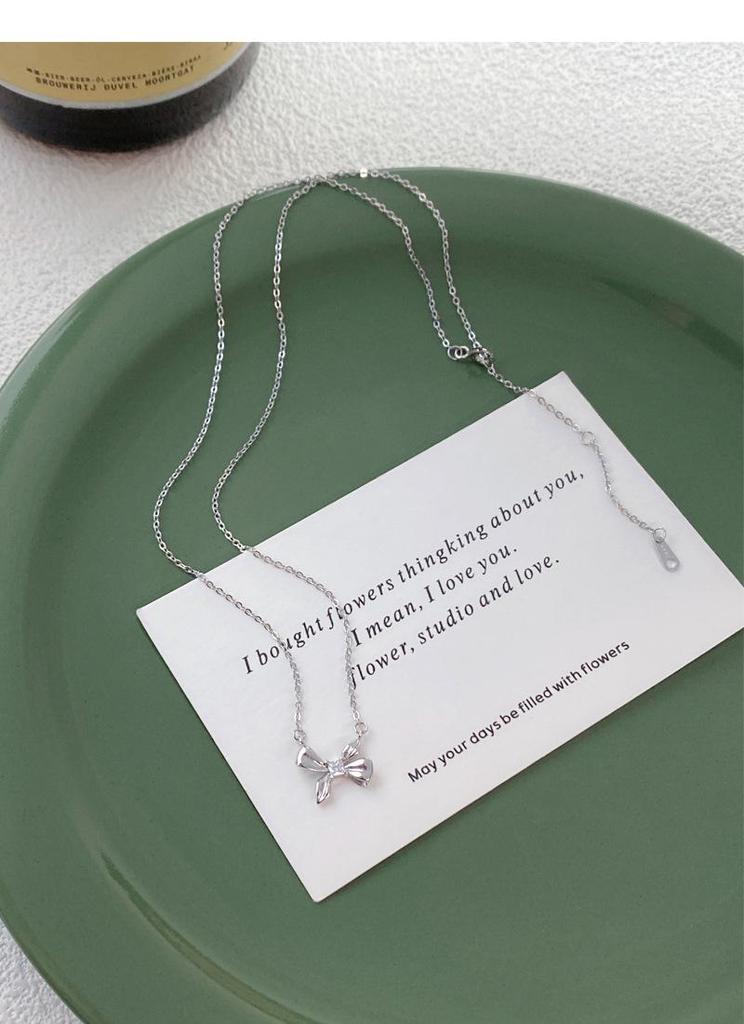 S999 Sterling Silver Elegant Bow Necklace - Simple & Luxurious Clavicle Chain for Women