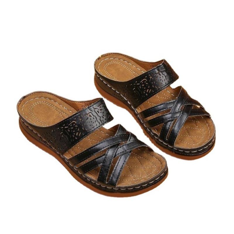 Thick-soled hollowed-out carved slippers women's slope heel open-toed beach shoes wish cool slippers