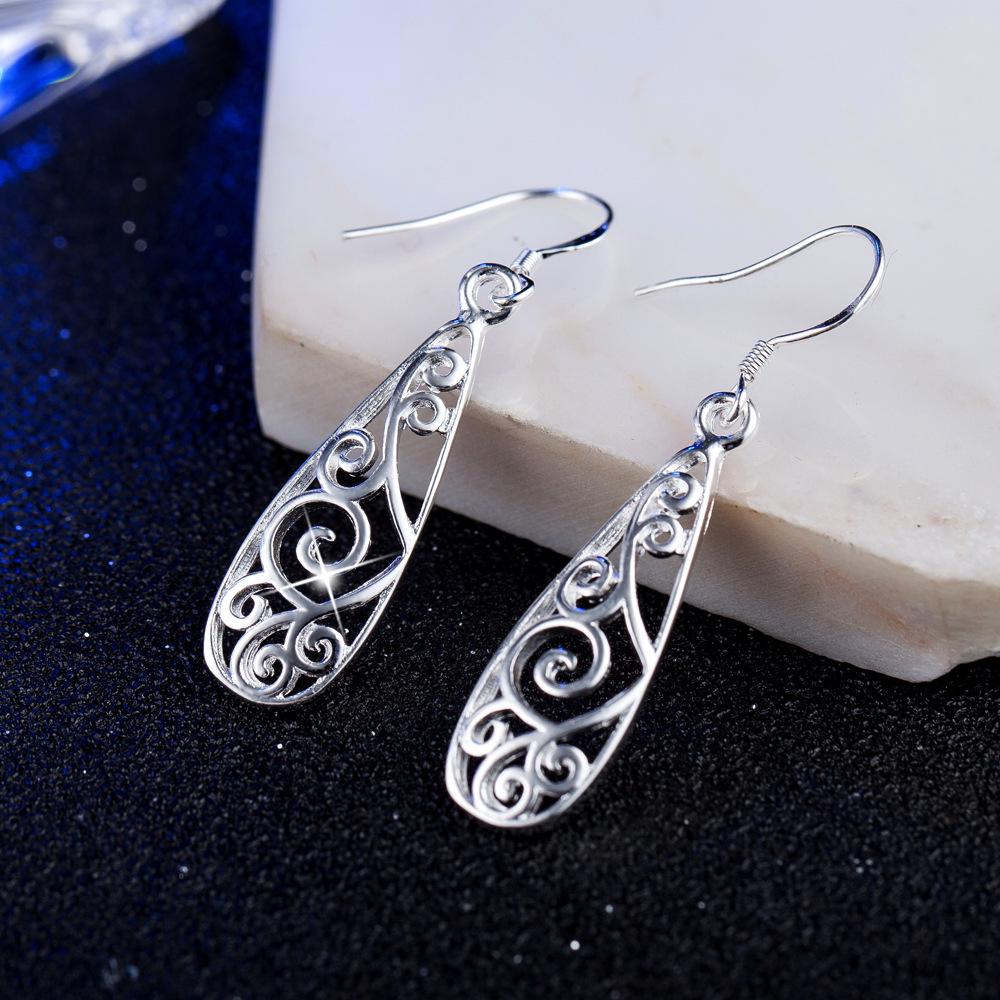 Silver-Plated Water-Drop Retro Hollow Earrings: Trendy and High-End Fashion for Europe and America