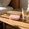 Portable Plastic Pill Organizer Four Compartment Travel Medicine Storage Box with Secure Snap Closure and Compact Design for Daily Use