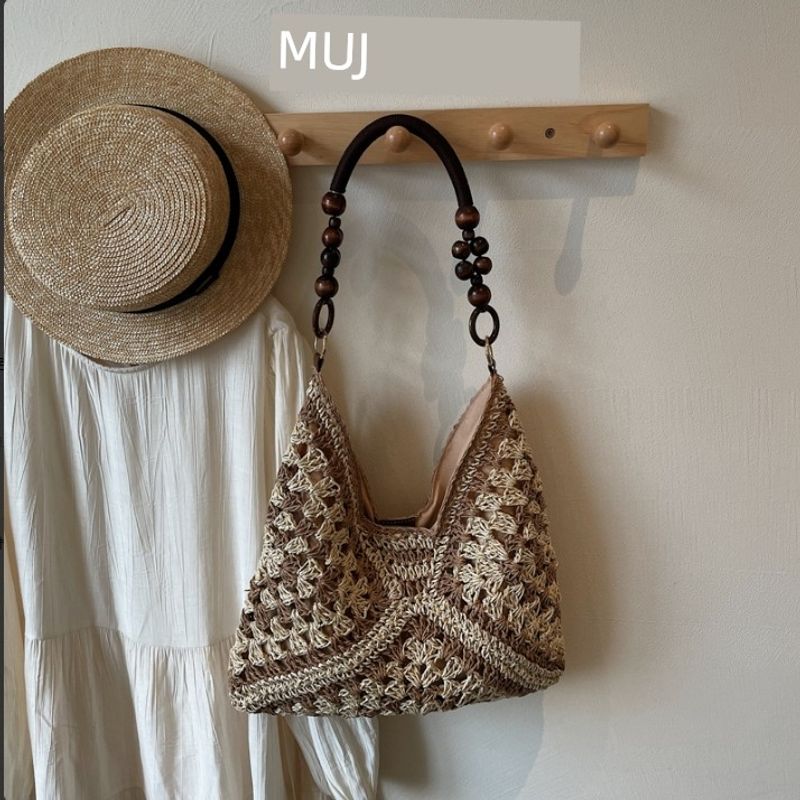 

Japan Non-Printed Muj Straw Bag Women New Seaside Vacation Hollow Shoulder Tote Bag Woven Vegetable Basket Bag Rice with khaki