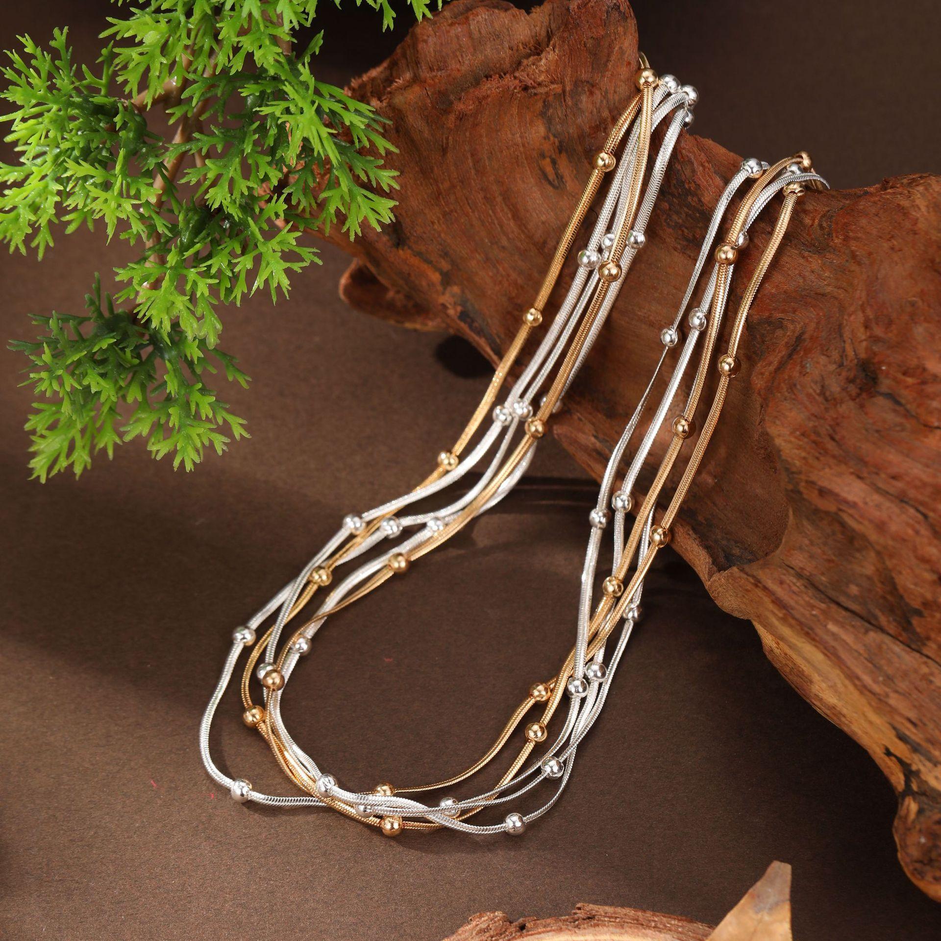 

Пятислойное ожерелье из бусин «змеиная кость», высококлассный эффект наслоения, женская двухцветная золотистая и серебристая цепочка на шею с магнитной застежкой