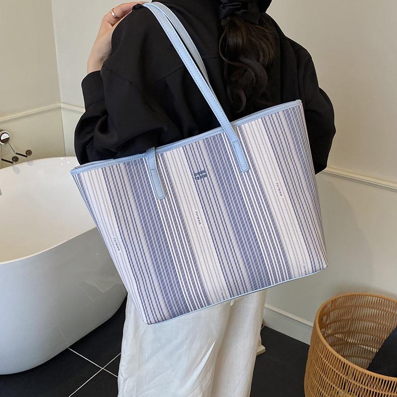 

Simple summer new large-capacity women s messenger tote bag casual trend versatile women s bag синій