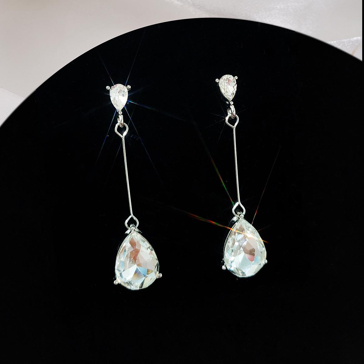 

Silver Needle Sparkly Teardrop Tassel Earrings with Diamond Studs - High-End Niche Design