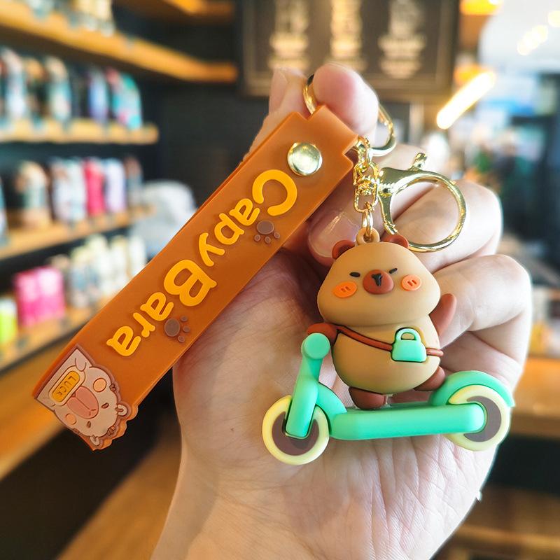 

7th Generation Bicycle Dolphin Shark Capybara Keychain Doll Machine Gift Premium Cartoon Cute Dolphin Hanging