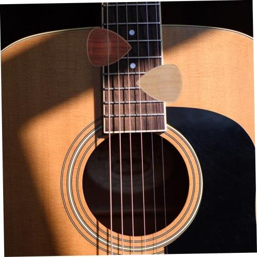 Ibasenice 4-Piece Wooden Guitar Picks with a Concave Design for Easy Grip, Suitable for Electric and Acoustic Guitars, Made from Rich Bass Wood