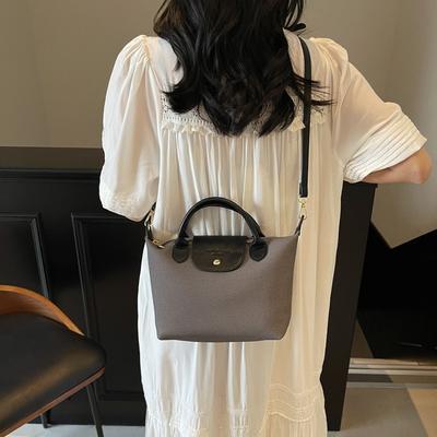 Canvasväska dam ny Longxiang-väska nischdesign bärbar axelväska dumplingväska messenger bag