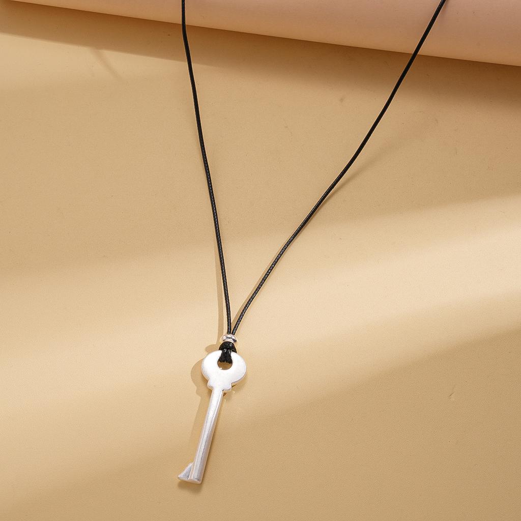 Simple metal key, black rope necklace, niche design, long sweater chain necklace