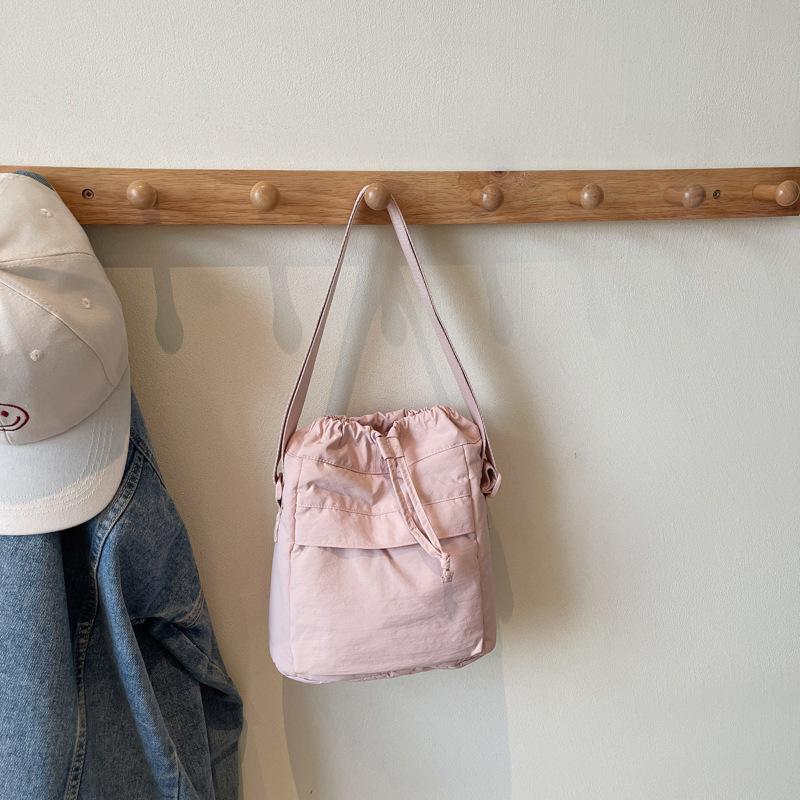 Japanese Personalized Small Square Bag Women'S Versatile Casual Nylon Cloth Drawstring Mobile Phone Bag Commuter Shoulder Messenger Bag